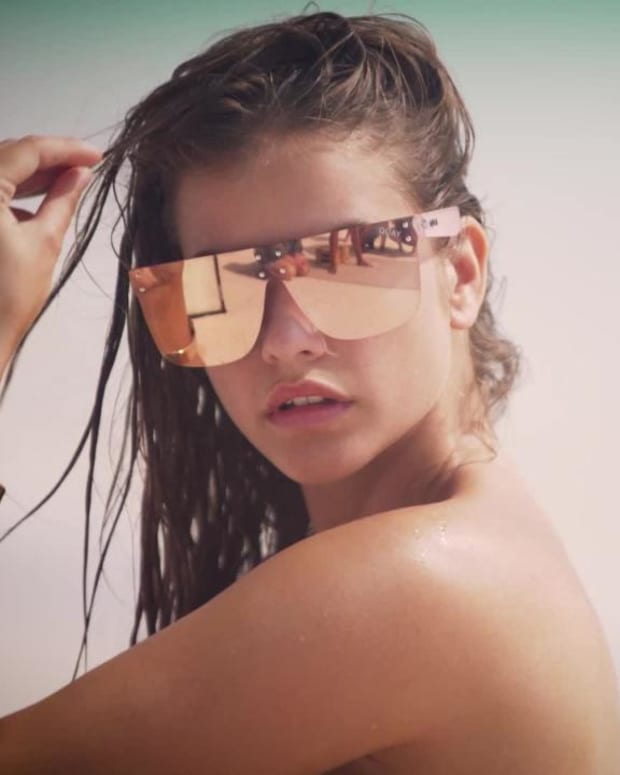 Barbara Palvin Rolls in the sand in the Bahamas